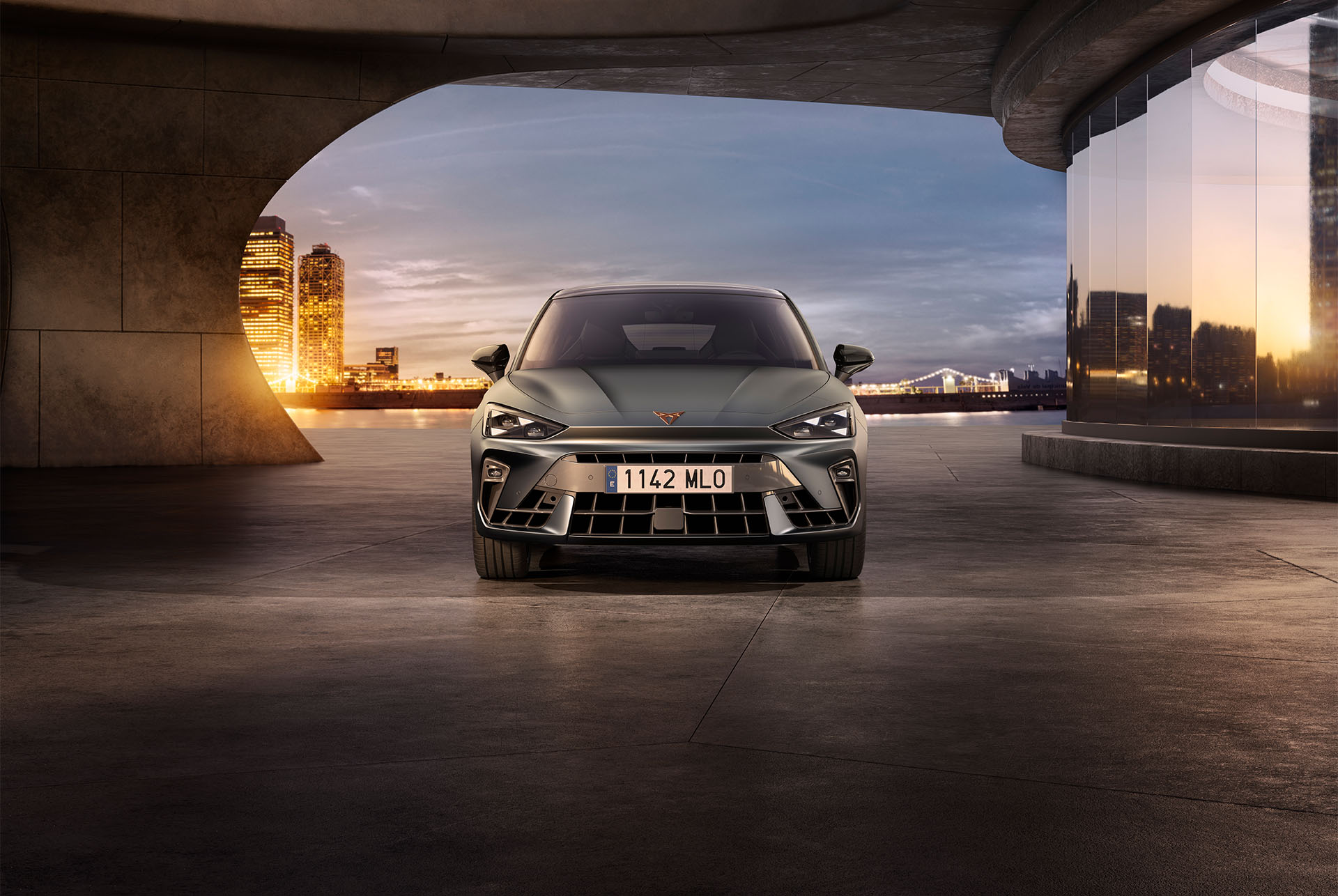 new cupra leon 2024 car model versions and equipment, air intakes, triangle eye headlights, sunset, glass panels, architecture and blue skies.
